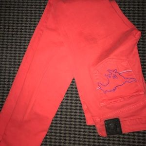 Red jeans with a mustang embroidered
